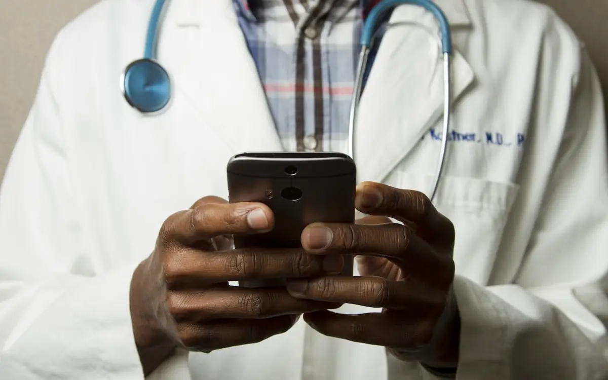 Healthcare professional using a mobile device